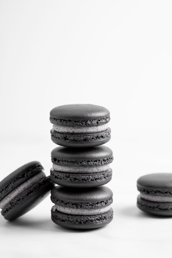 stack of black macarons