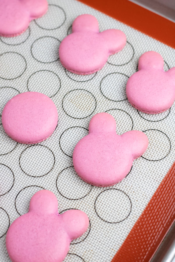 pink bunny macaron shells on silicone mat