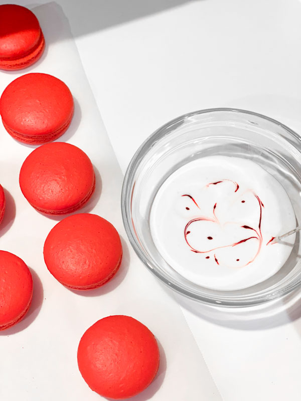 red and white royal icing for candy cane macarons