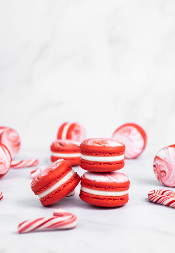 red and white candy cane macarons