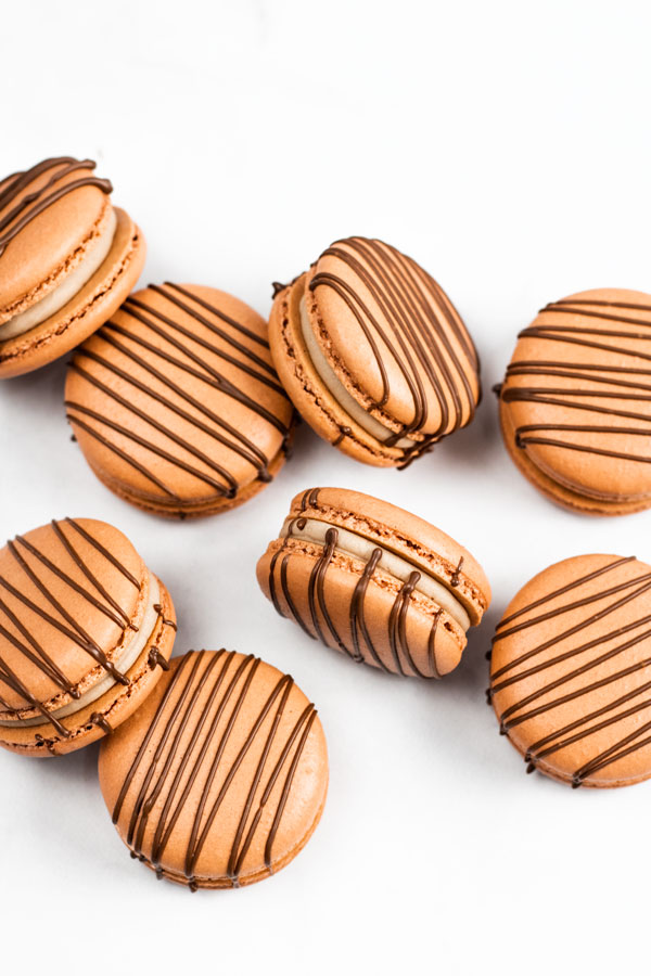 chocolate macarons with chocolate drizzle