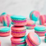 stack of three blue and pink cotton candy macarons