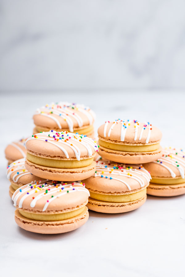 dulce de leche macarons stacked on top of each other