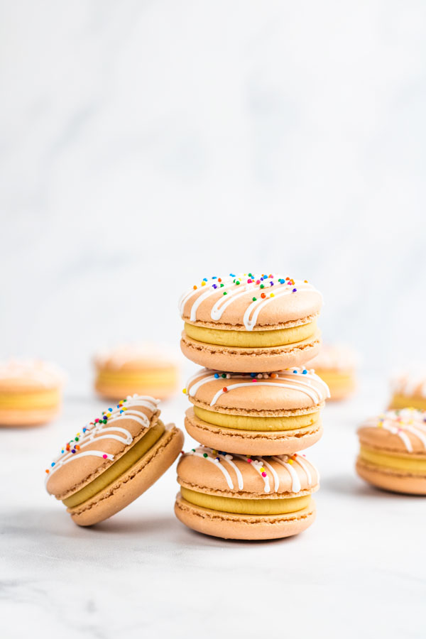 dulce de leche macarons stacked on top of each other