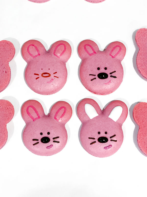 pink bunny macarons with step-by-step royal icing decorations