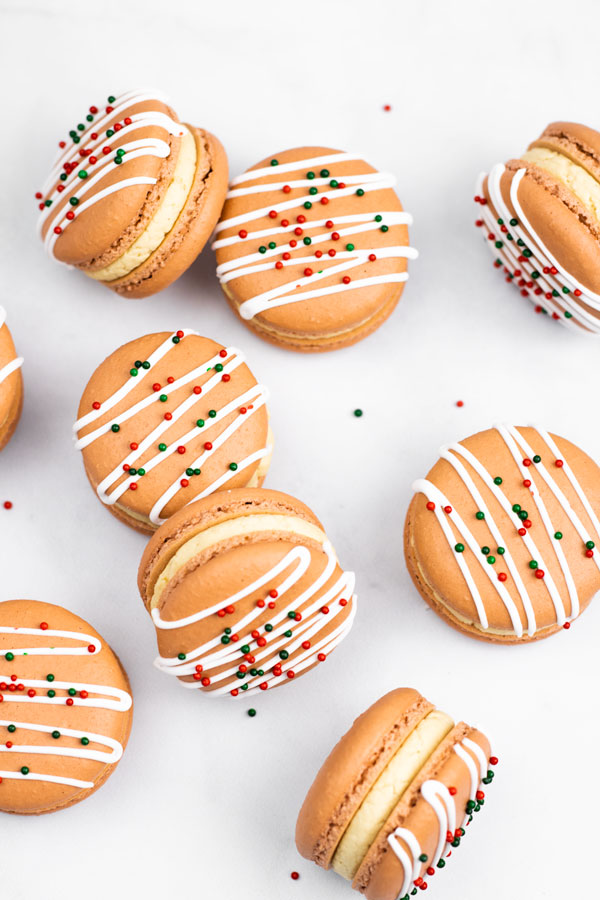 gingerbread macarons with royal icing and sprinkles
