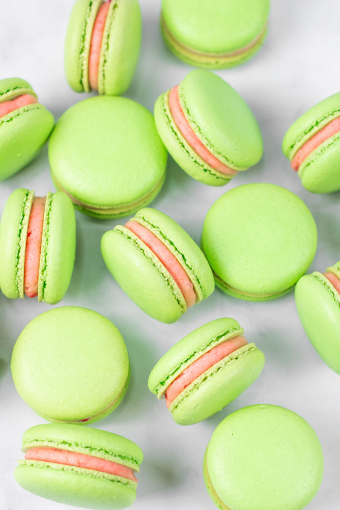 green guava macarons with pink guava buttercream