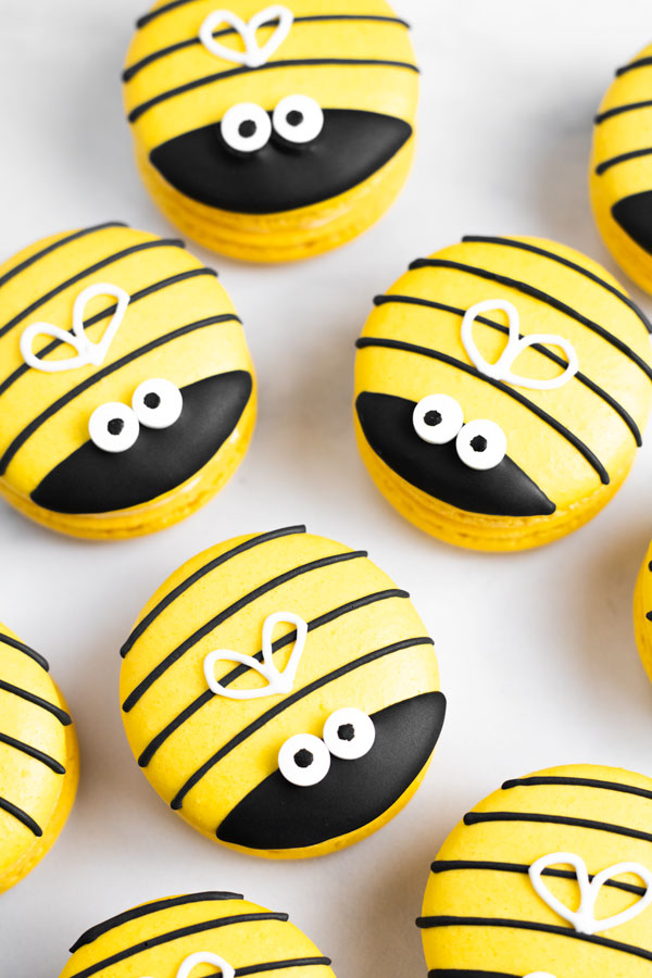 yellow and black honey macarons