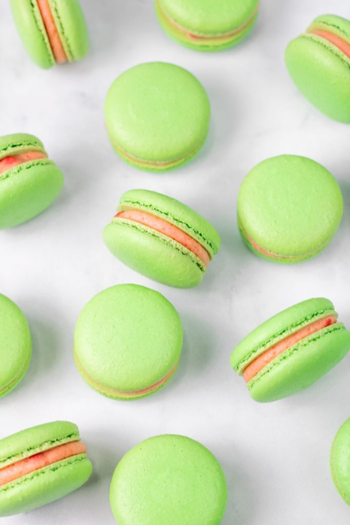 green guava macarons with pink guava buttercream