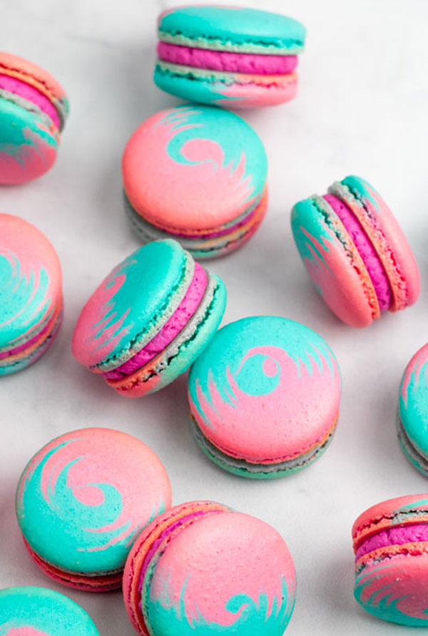 swirled pink and blue cotton candy french macarons with pink filling