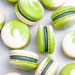 green and white swirled matcha macarons