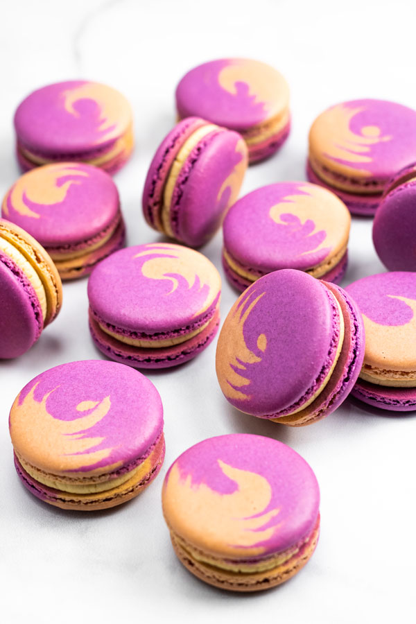 purple and brown peanut butter and jelly macarons